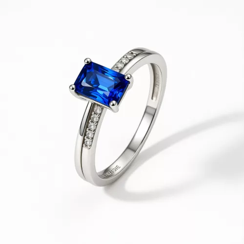 14K fehér arany gyűrű 0,69Ct kék zafírral és gyémántokkal